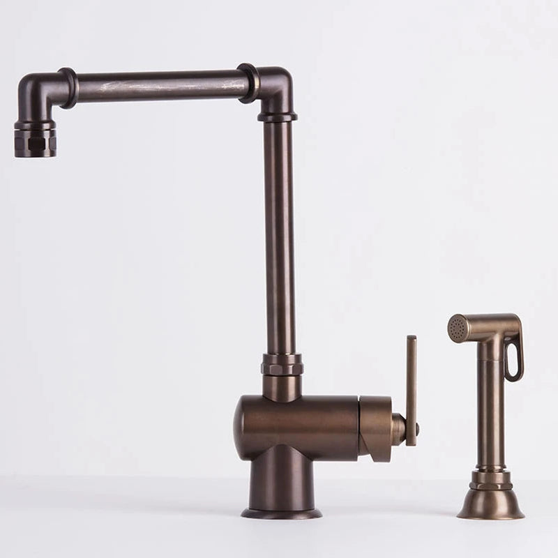Bronze kitchen faucet on a white background
